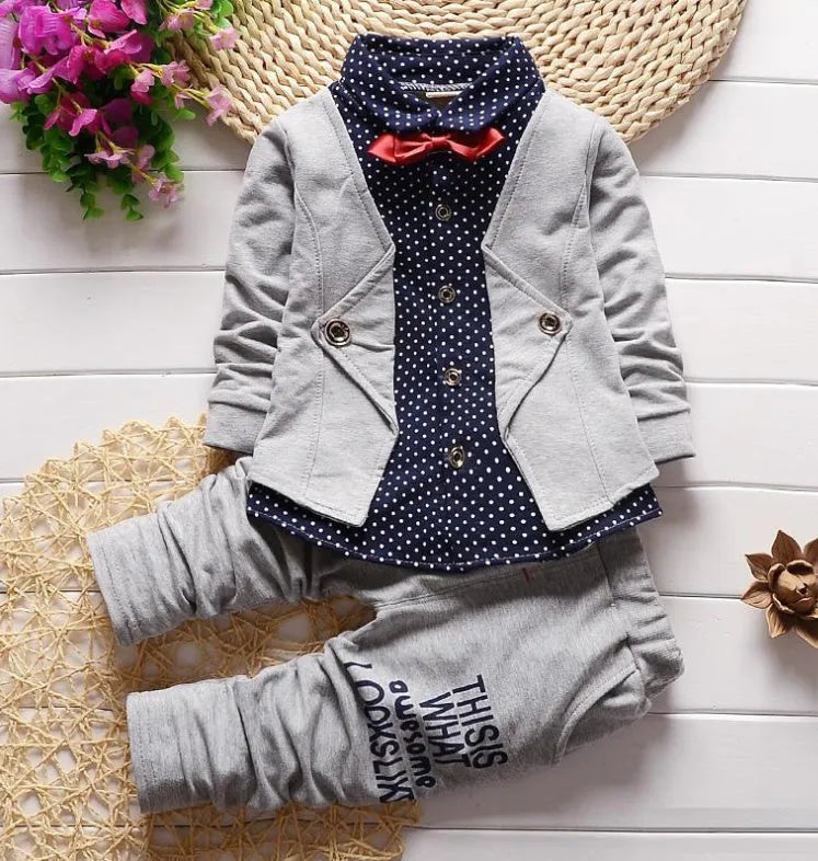 Casual blue kids sport suit consisting of a short-sleeved top and long trousers on a child mannequin.