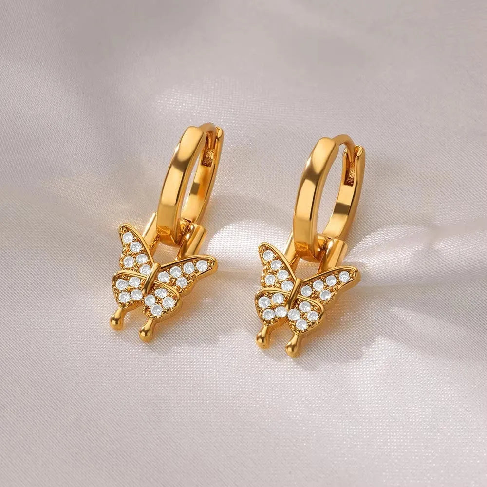 Geometric butterfly and heart-shaped women's earrings in copper with diamond treatment, multiple colours.