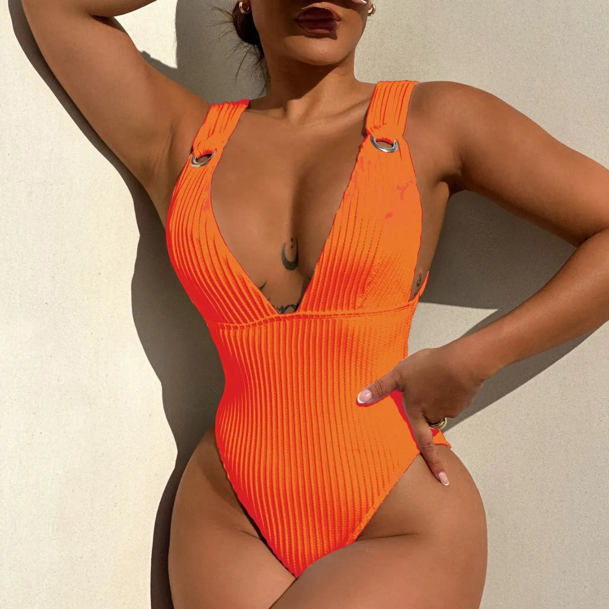 Women's solid colour one-piece swimsuit in black white green or orange with Spandex lining