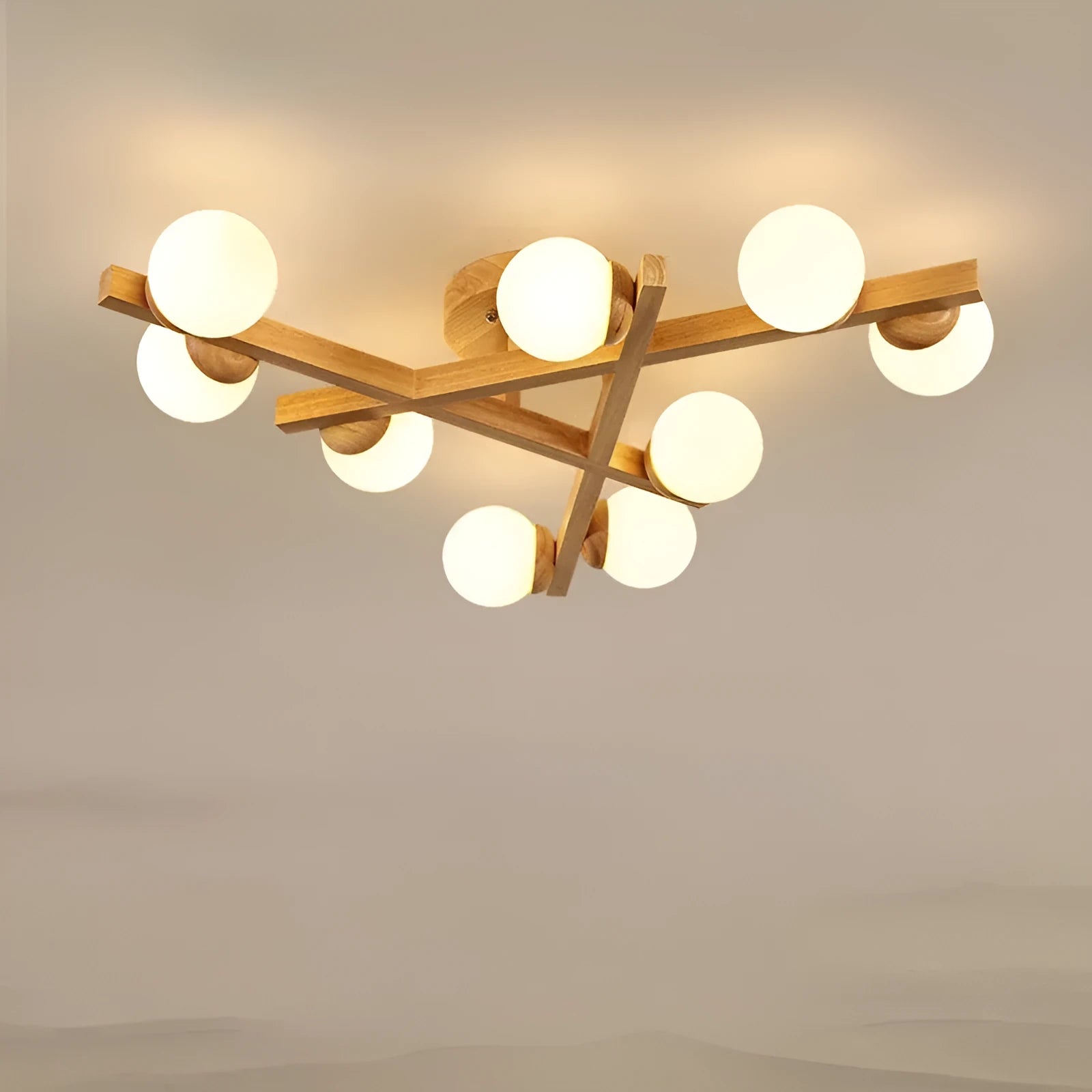Wooden style modern Nordic ceiling light with three neutral light heads.