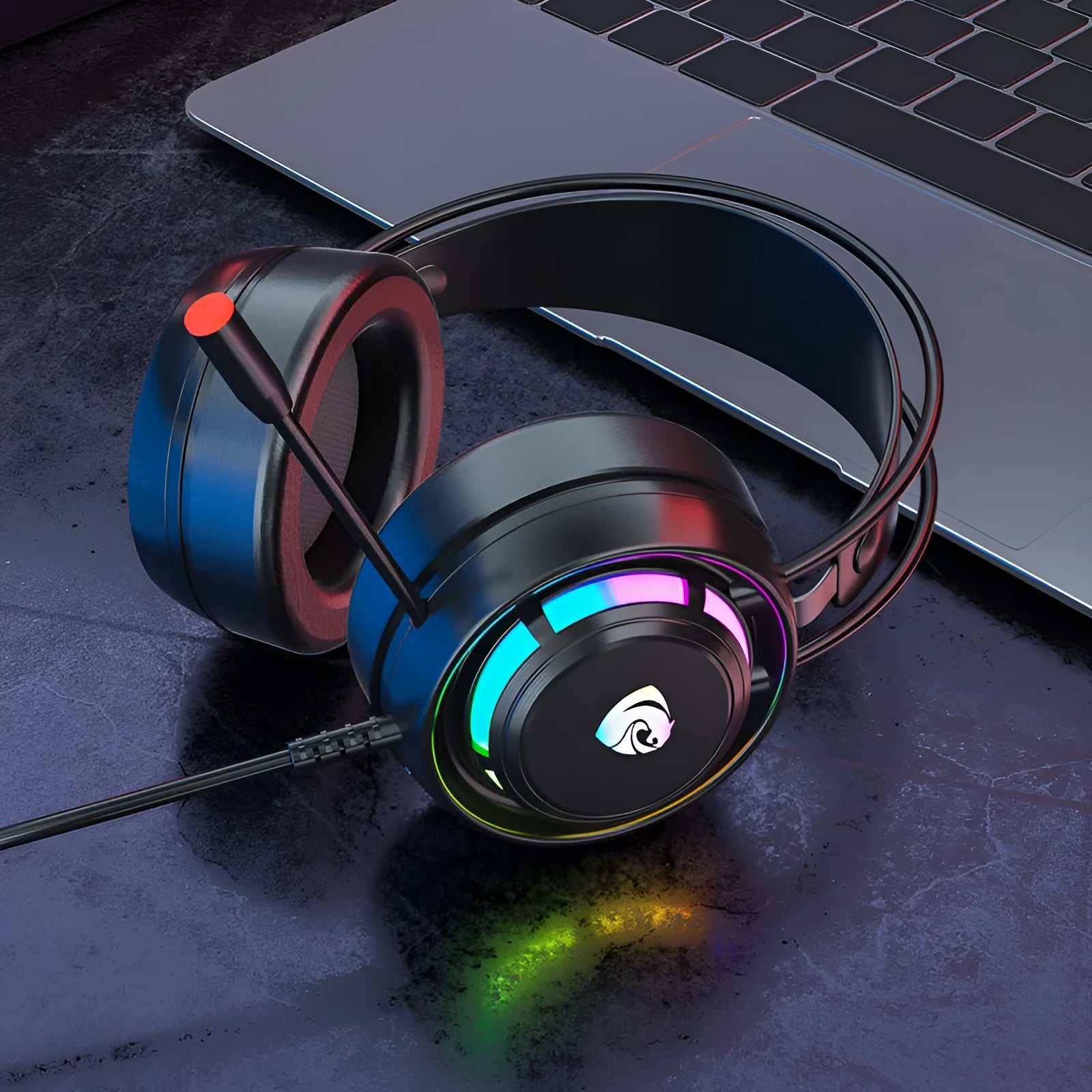 Black wired computer gaming headset with microphone and over-ear sponge cushions.