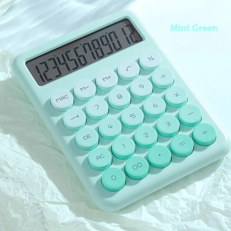 Desk calculator with gradient colour finish in pastel violet, pink, blue, or green.