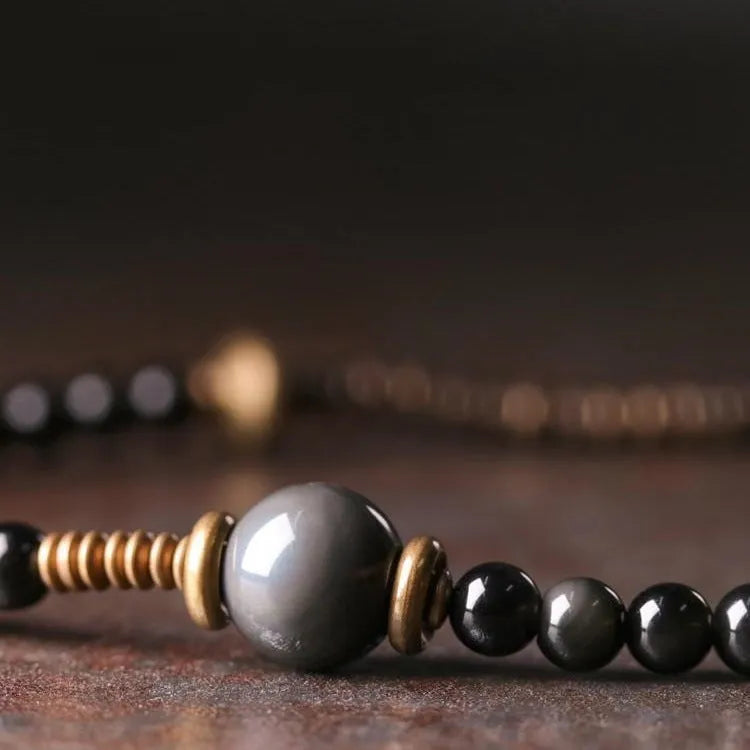 Black geometric beaded bracelet with multi-layered retro design