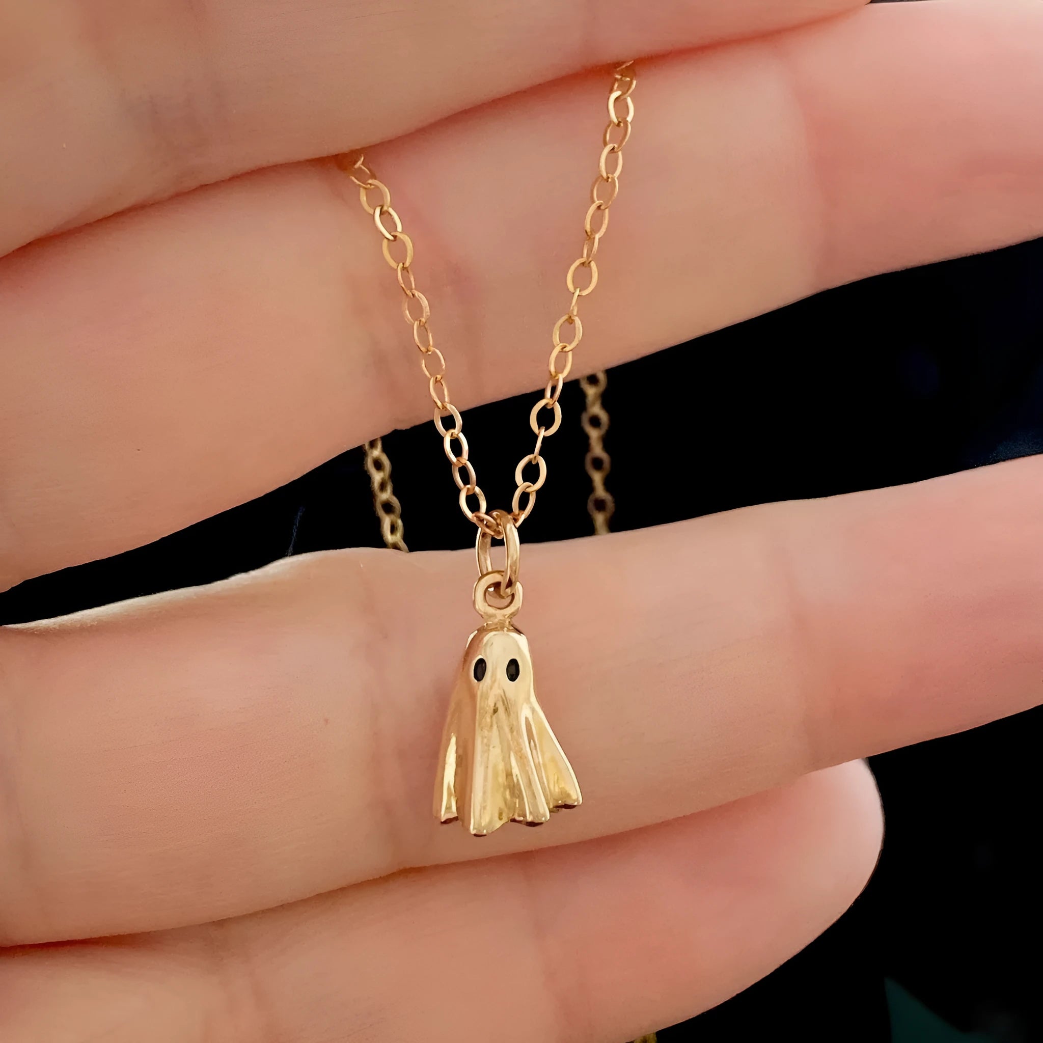 Ghost pendant necklace with titanium steel pendant on a stainless steel chain, showing chain style options.