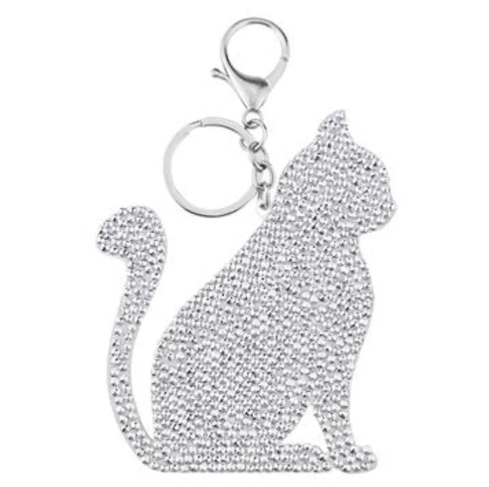 Diamond painting keychain craft kit with four style options: ladybird, Santa Claus, unicorn, on a white background