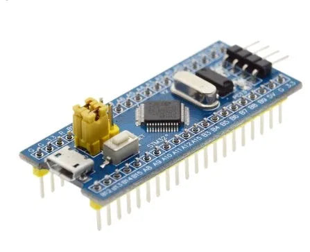 STM32F103C8T6 ARM Cortex-M3 minimum system development board on a green PCB