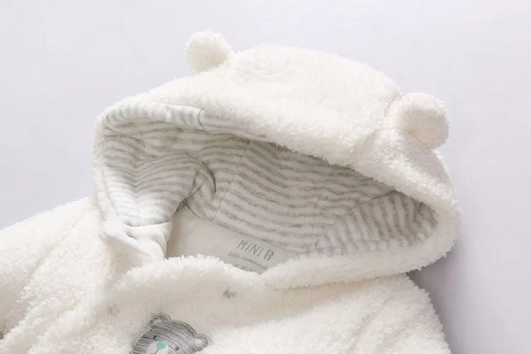 Cotton padded baby romper with lamb print, long sleeves, and foot covers in brown colour.