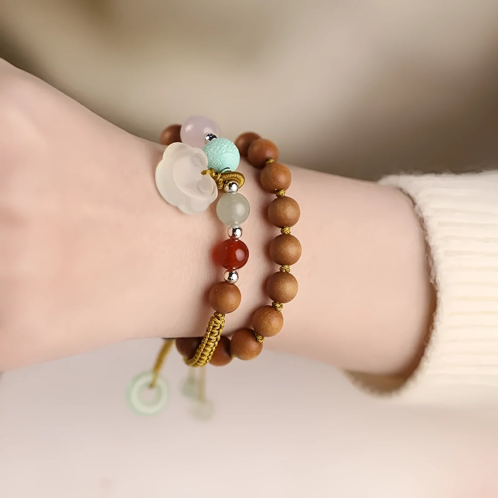 Hand-woven women's ebony bracelet with sandalwood fragrance and traditional double ring design