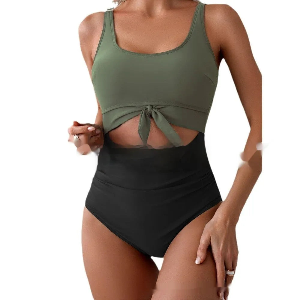 One-piece female swimsuit with contrast colour straps and covered belly in Rose-Red + Black colour option