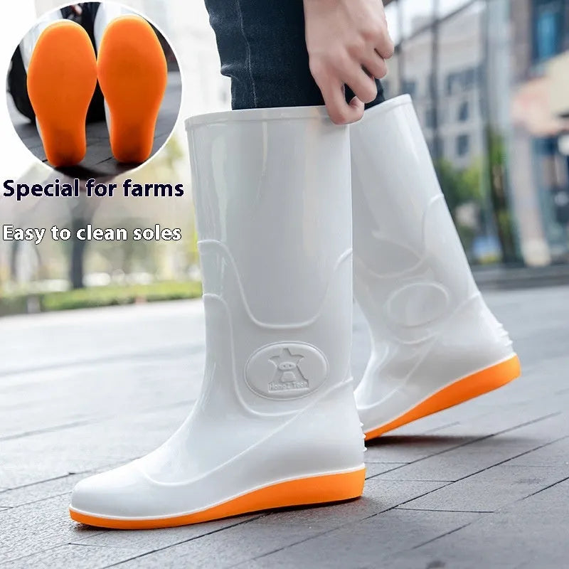Flat washable plastic rain boots in white with high tube design and round toe