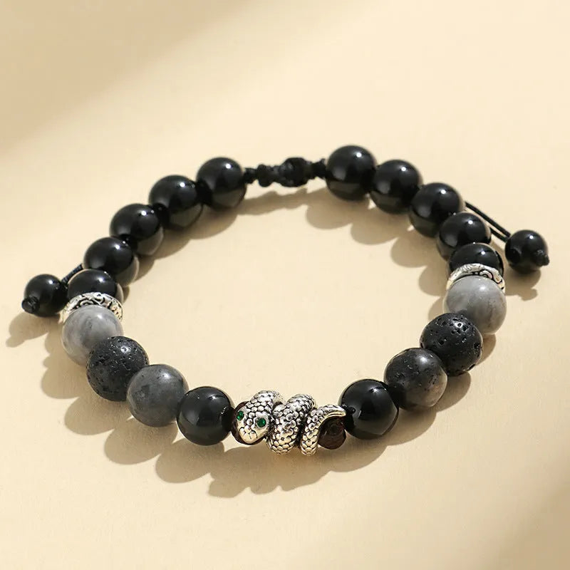 Black and white agate couple bracelets with snake clasps, turquoise accents, and glitter beads