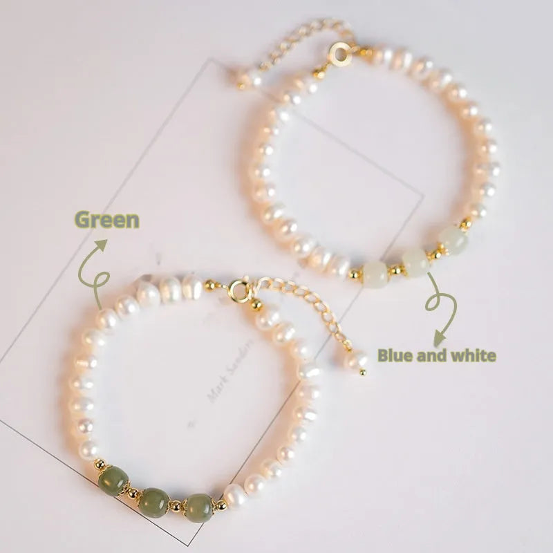 Natural freshwater pearl bracelet with diamond-shaped beads in Hetian jade colours on wrist