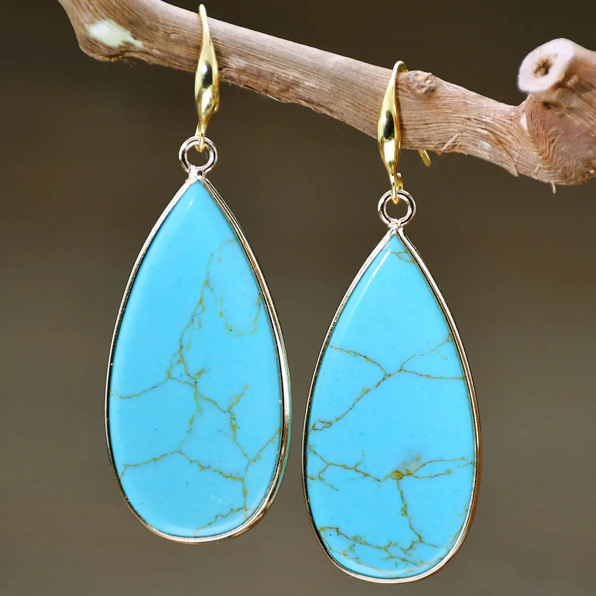 Vintage long water drop stone earrings in tigereye colour with retro styling