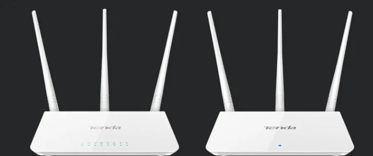 White dual-band wireless broadband router on a desk.