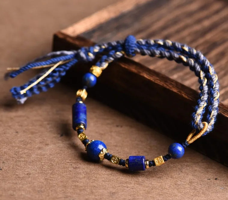 Hand woven DIY watch bracelet with lapis lazuli coloured rope and flexible wire in an ethnic style.