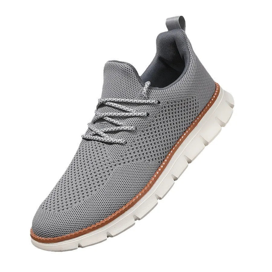 Men's casual sneaker with mesh upper in black or grey colour with round toe design