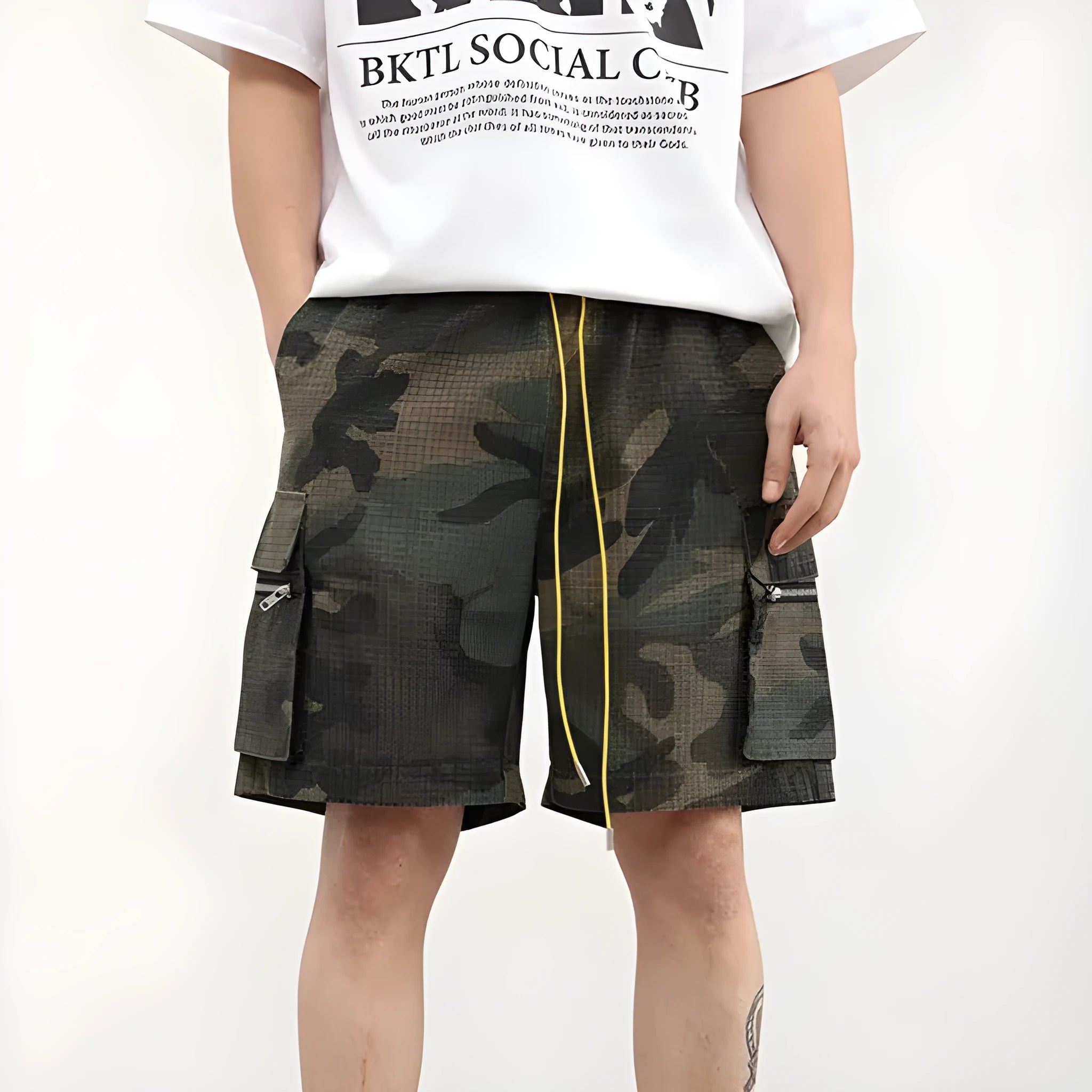 Men's camouflage cargo shorts with multiple pockets showing cropped length and mid-waist design