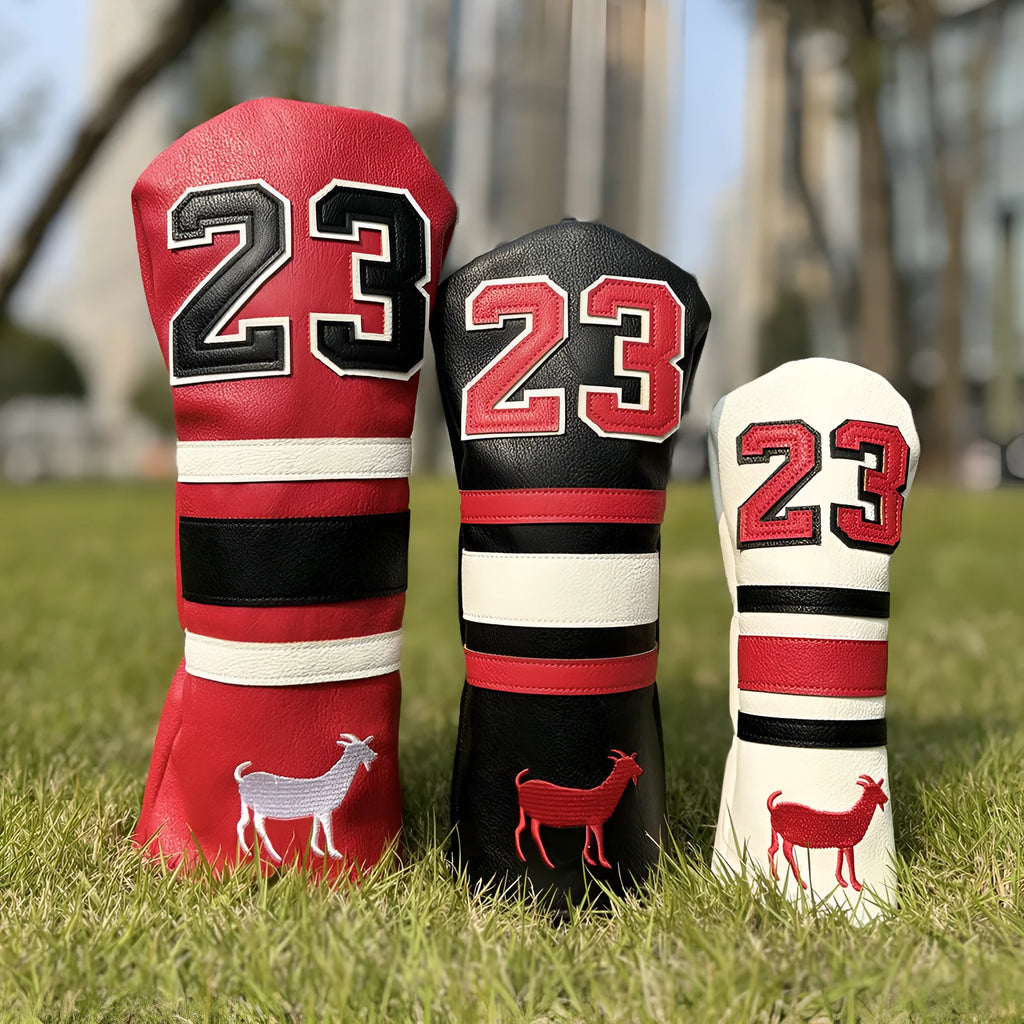 Set of coloured chicken drumstick design golf club head covers for fairway woods, a square putter, and irons.