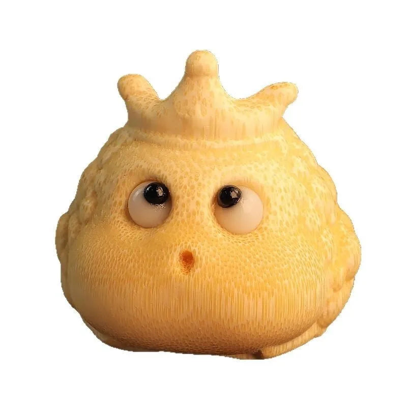 Solid bamboo carving of a Crown Princess toad ornament with live eye detail in a cute style.