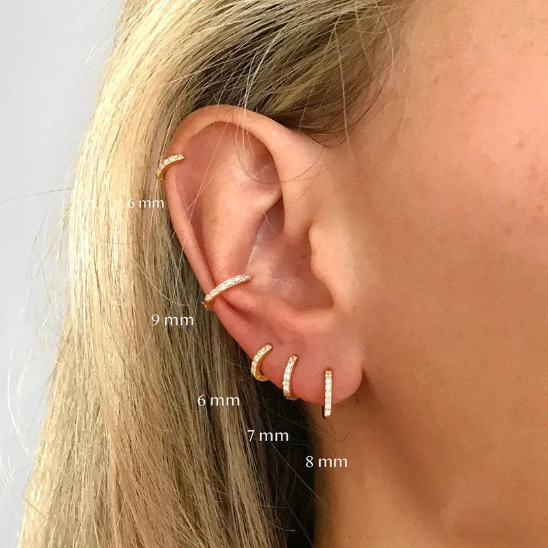 Geometric perforated stud earrings with circle zircon decoration in gold, rose gold and silver colours