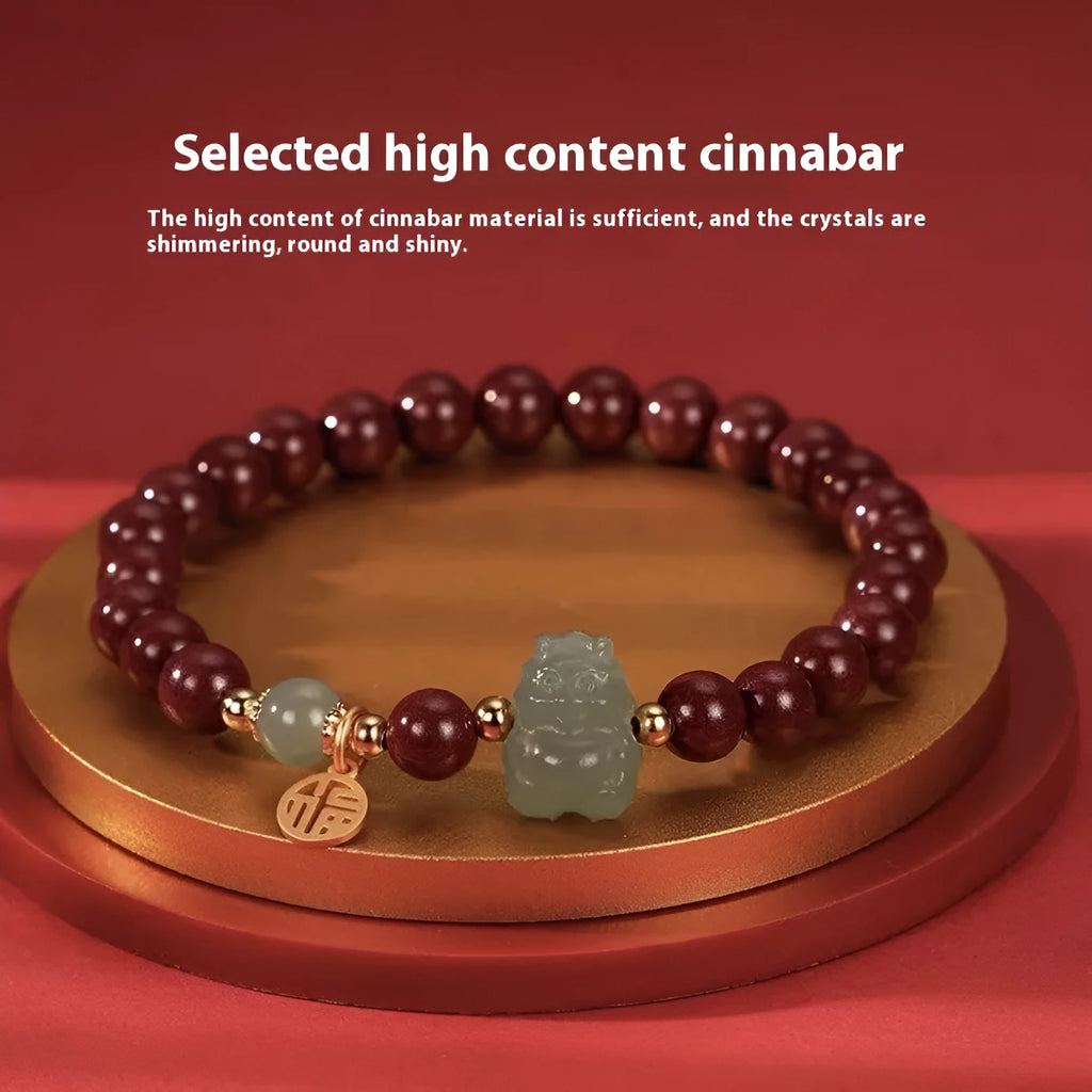Hetian Jade bracelet with cinnabar accents showing 8mm beads and animal zodiac modelling