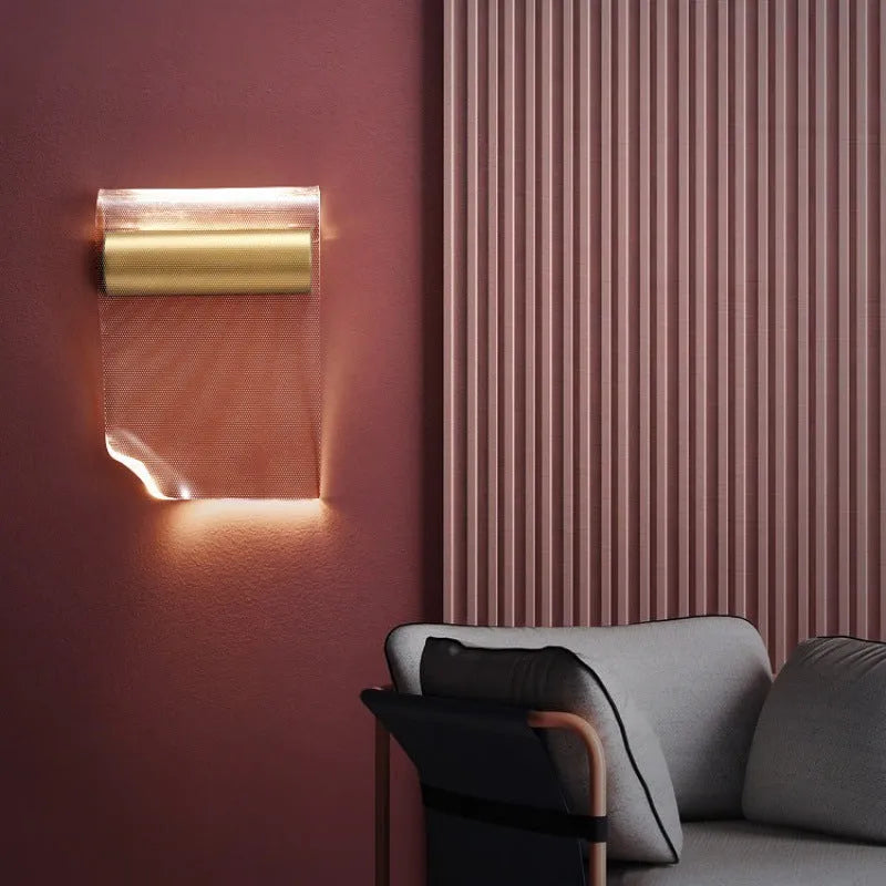 Simple wall lamp with a bendable arm and acrylic shade mounted on a wall.