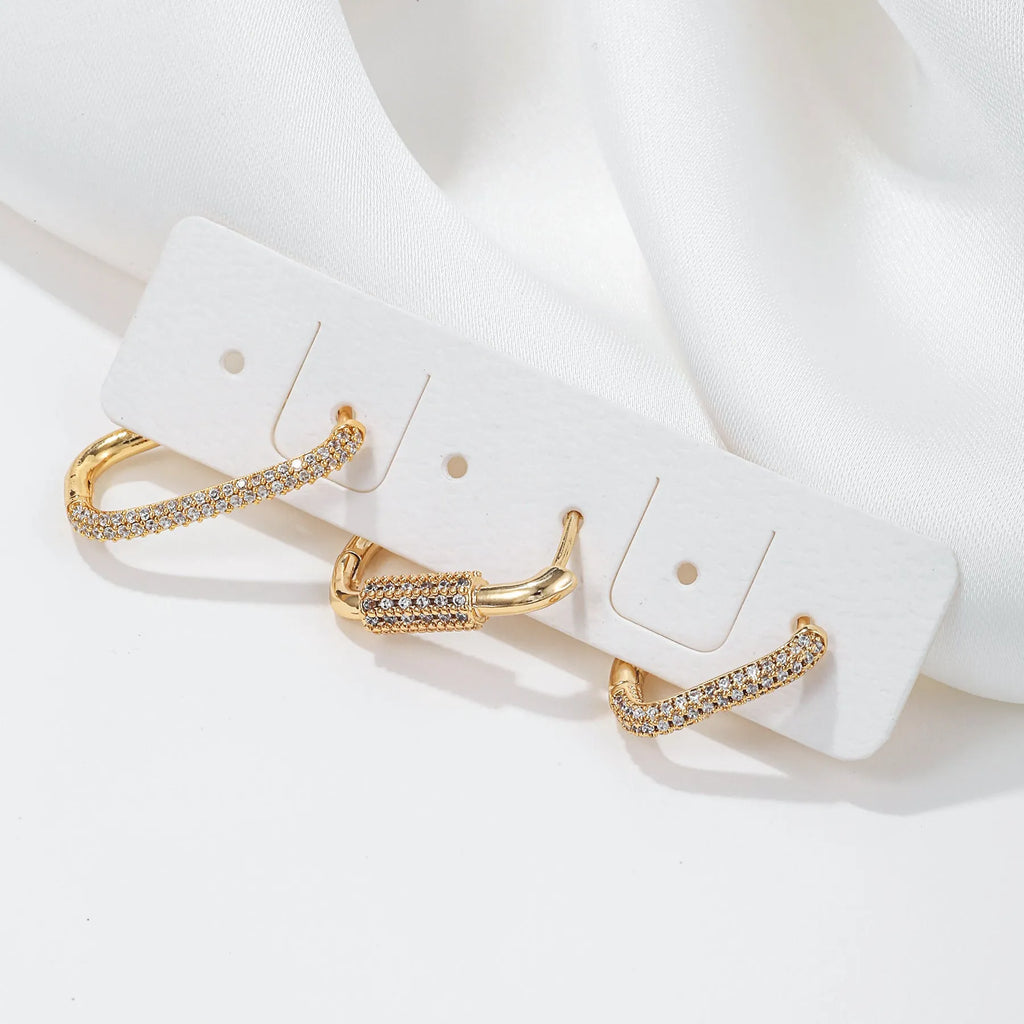 Geometric three-piece copper ear clip set with micro inlaid zircon detailing in gold or white finish