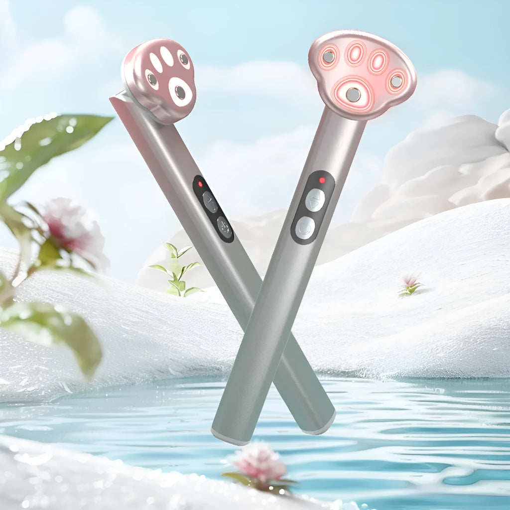 Cat's Paw design micro-current eye massager in gradient pink with LED light display.