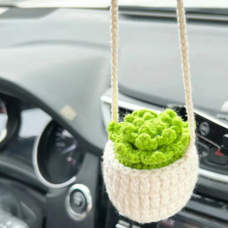 Green and white knitted wool car plant decoration with 8cm base and 25cm hanging rope