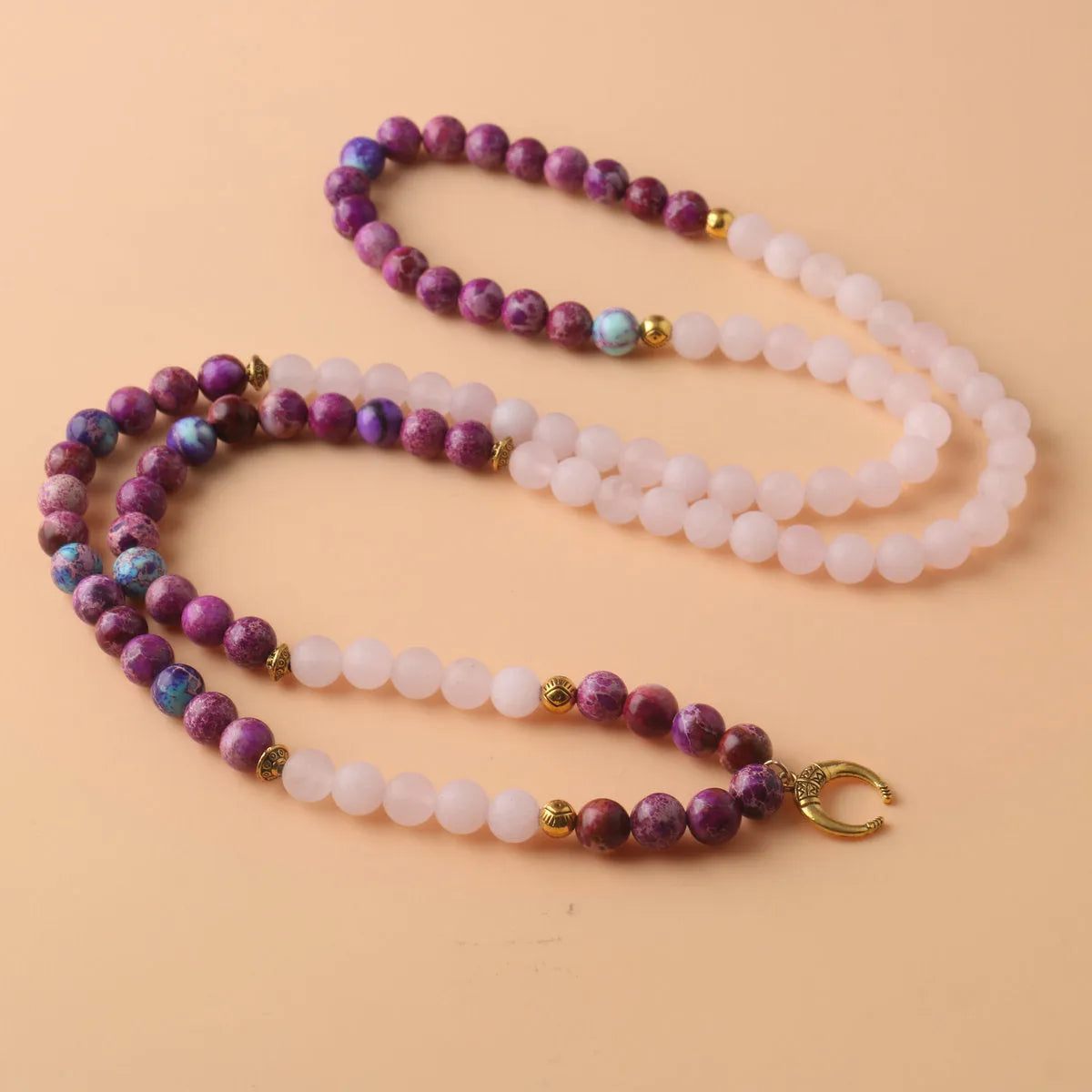 Pink crystal emperor stone round bead pendant necklace for casual unisex wear