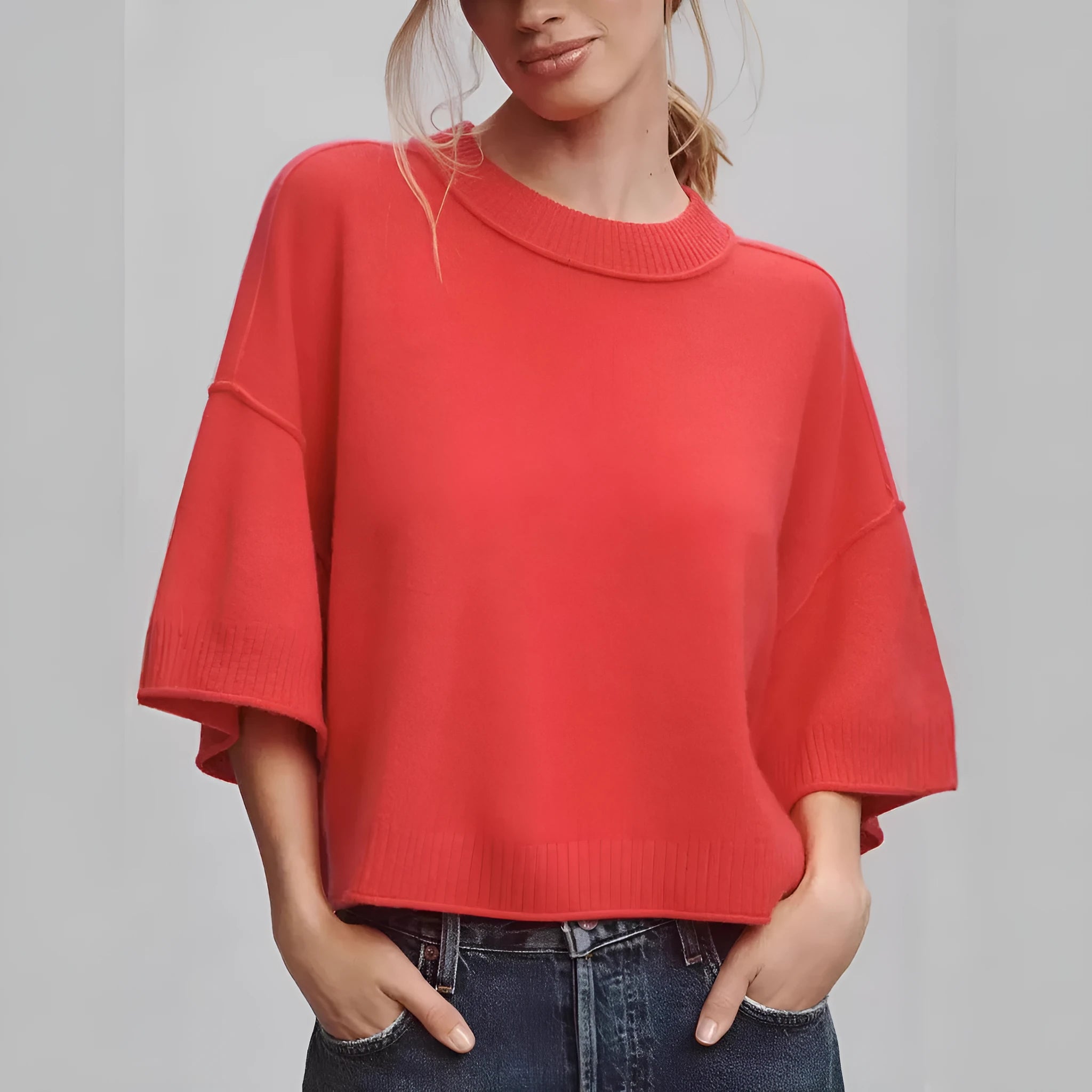 Red solid colour hot girl style T-shirt with an exposed navel crop top design on a mannequin.
