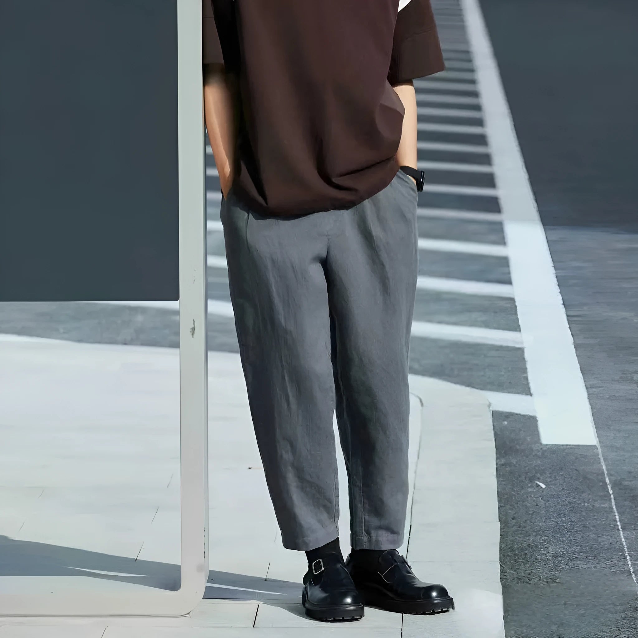 Men's loose straight-leg casual trousers with a drawstring waistband in beige.