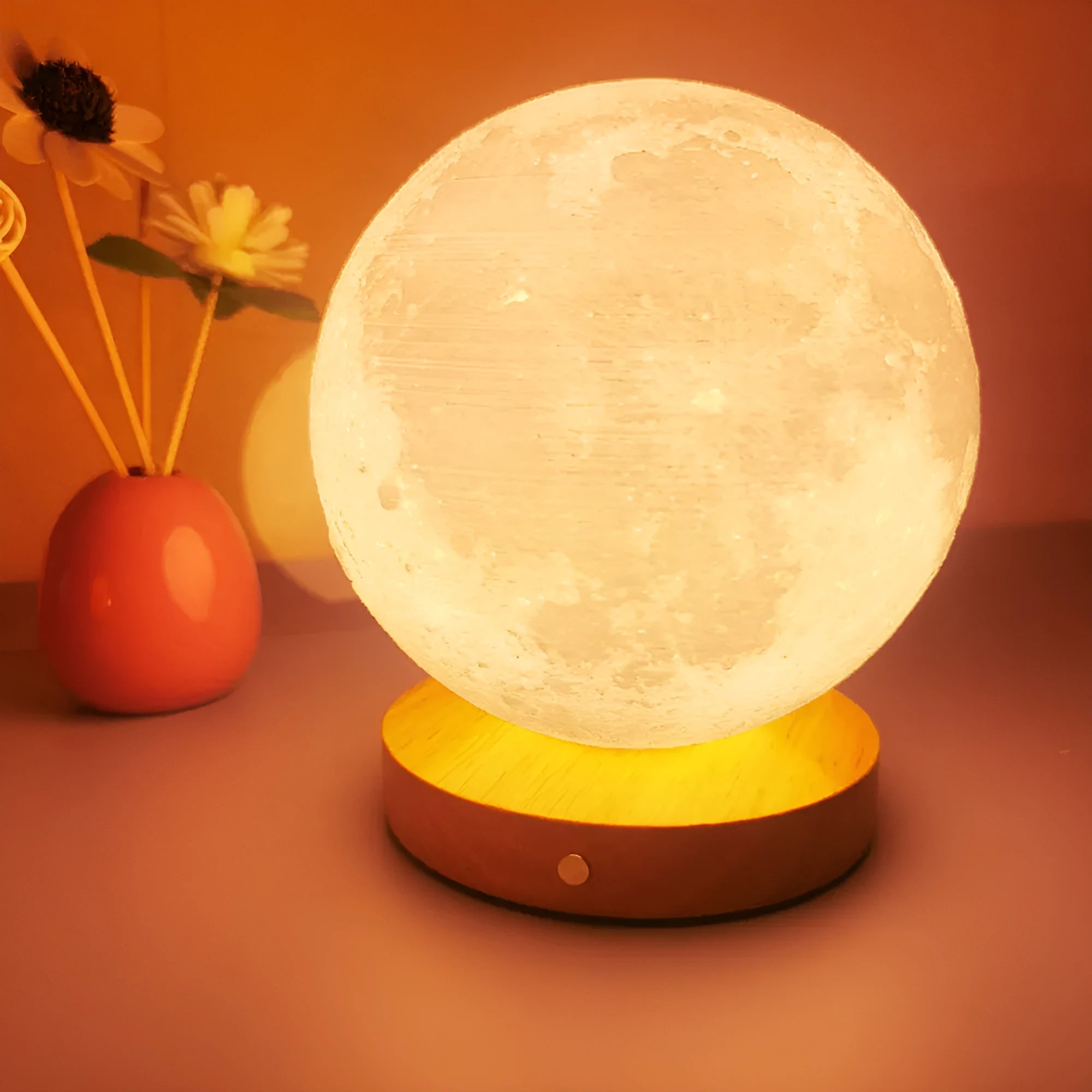 Rotating moon night lamp with wooden base showing three colour modes