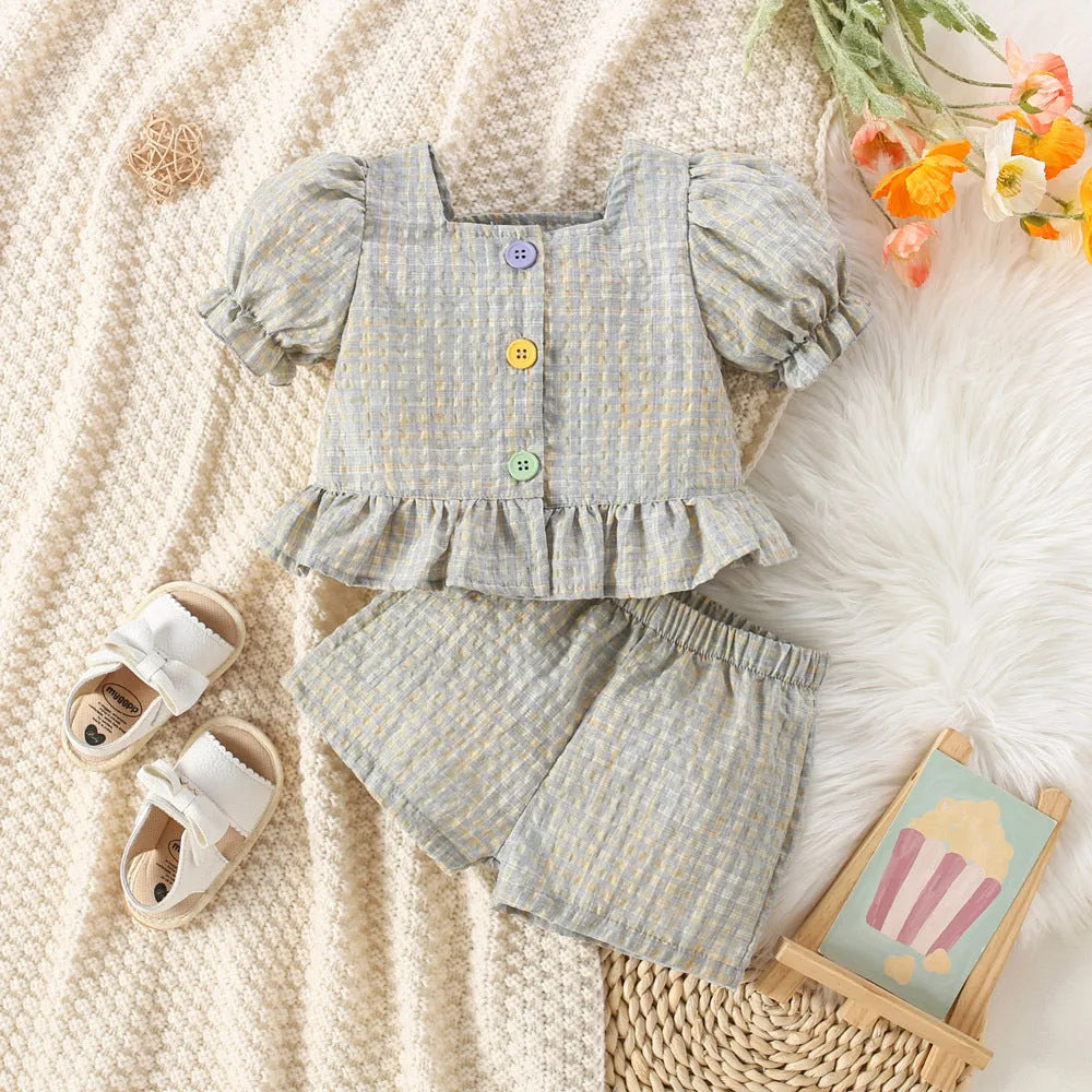 Girls cotton plaid top and shorts suit two-piece set in red, flat lay view