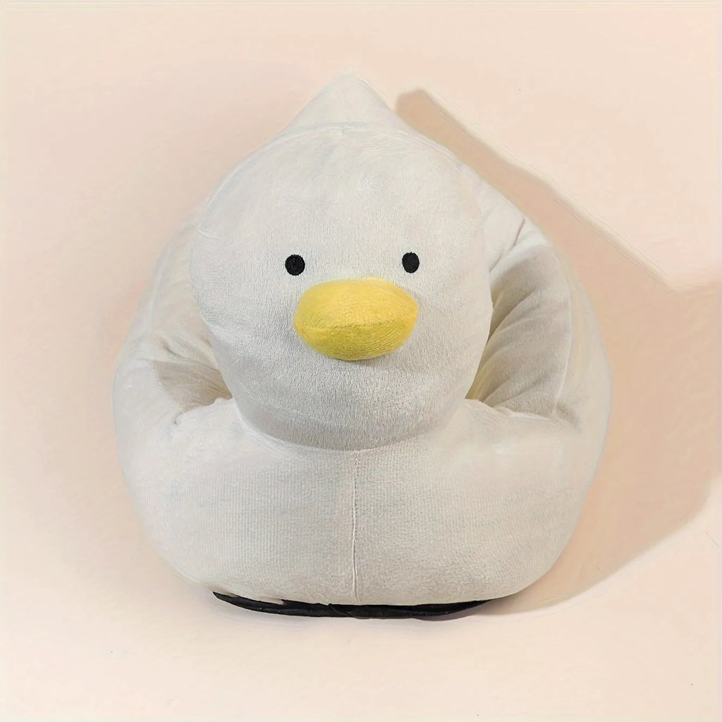 Blue duck-shaped fluffy pet bed sofa for a small dog, showing raised sides and soft material.