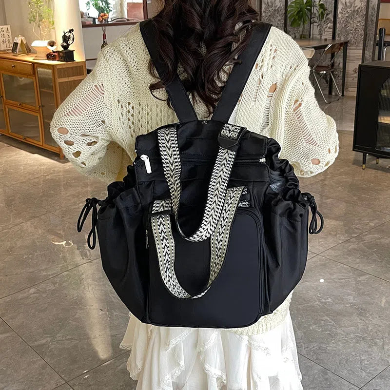 Nylon mommy bag in large capacity tote style, available in multiple colours for travel and daily use