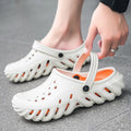 Men's beige EVA slipper sandals with ventilation holes and a non-slip rubber-like sole.