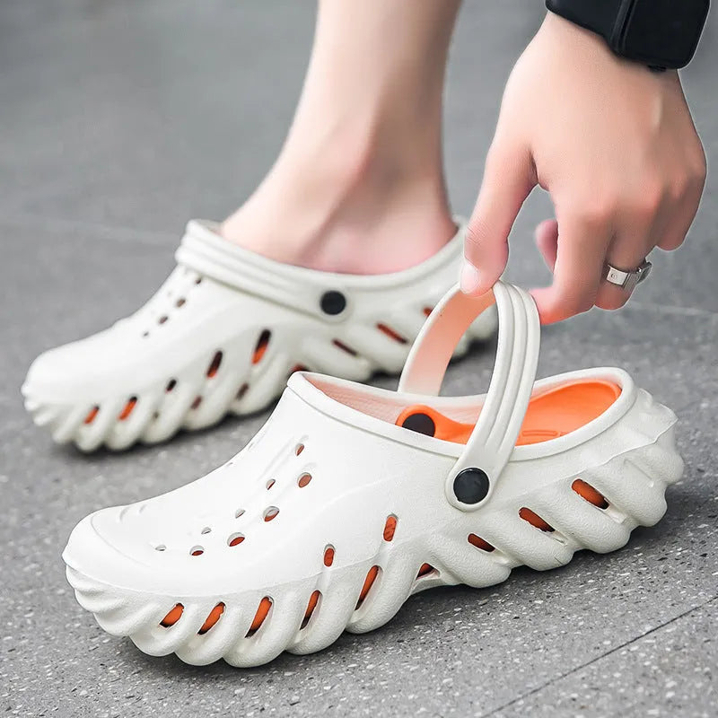 Men's beige EVA slipper sandals with ventilation holes and a non-slip rubber-like sole.