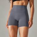 Women's high waist fitness tights in dark green colour with hip lift design for workout and daily wear