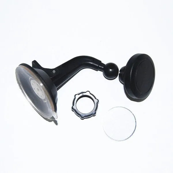 Black magnetic car phone holder mounted on a dashboard, showing a smartphone attached at an angle.