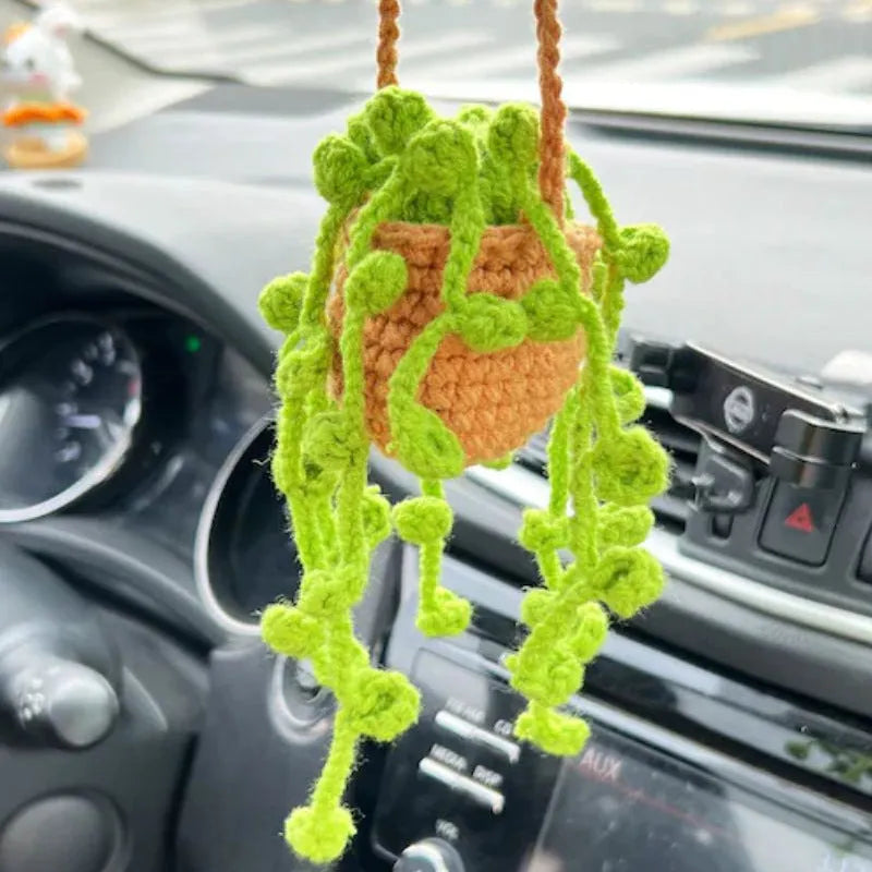 Green and white knitted wool car plant decoration with 8cm base and 25cm hanging rope
