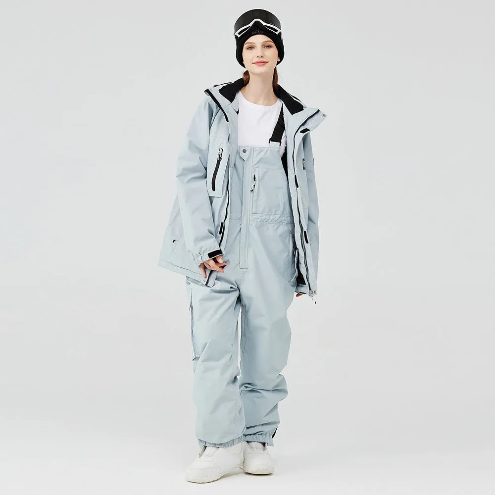 Blue and black unisex waterproof winter ski suit with top and pants for snow sports