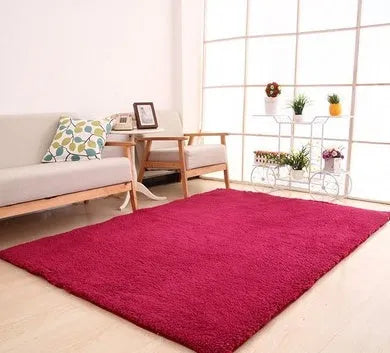 Solid colour fluffy area rug with non-slip dotted backing in a neutral living room setting
