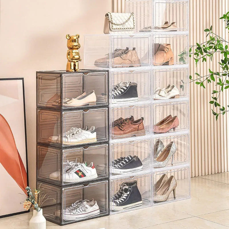 Clear acrylic shoe storage box with magnetic side door showing visible shoe organisation