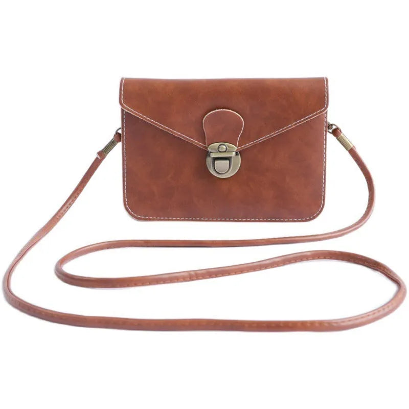 Retro messenger bag in wine red with flap closure and crossbody strap shown alongside black and light brown colour options