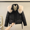 Women's short cotton-padded jacket with stand-up collar in loose fit style
