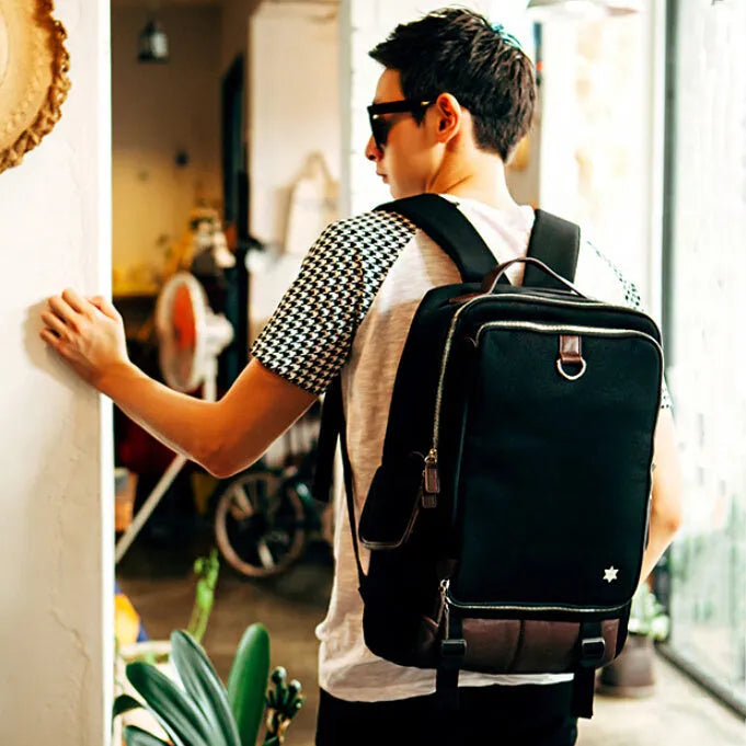Men's Oxford cloth backpack in a modern Korean design, shown in Army Green colour, with dimensions 30x16x46cm.