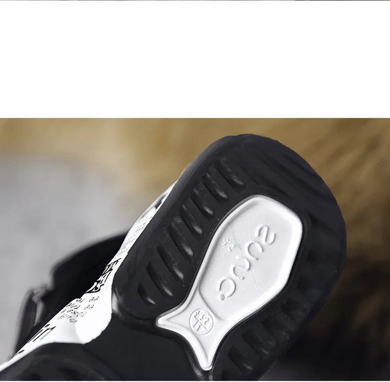 High-top snow boots with fleece lining, suede upper, and rubber platform sole in 2280 black and white