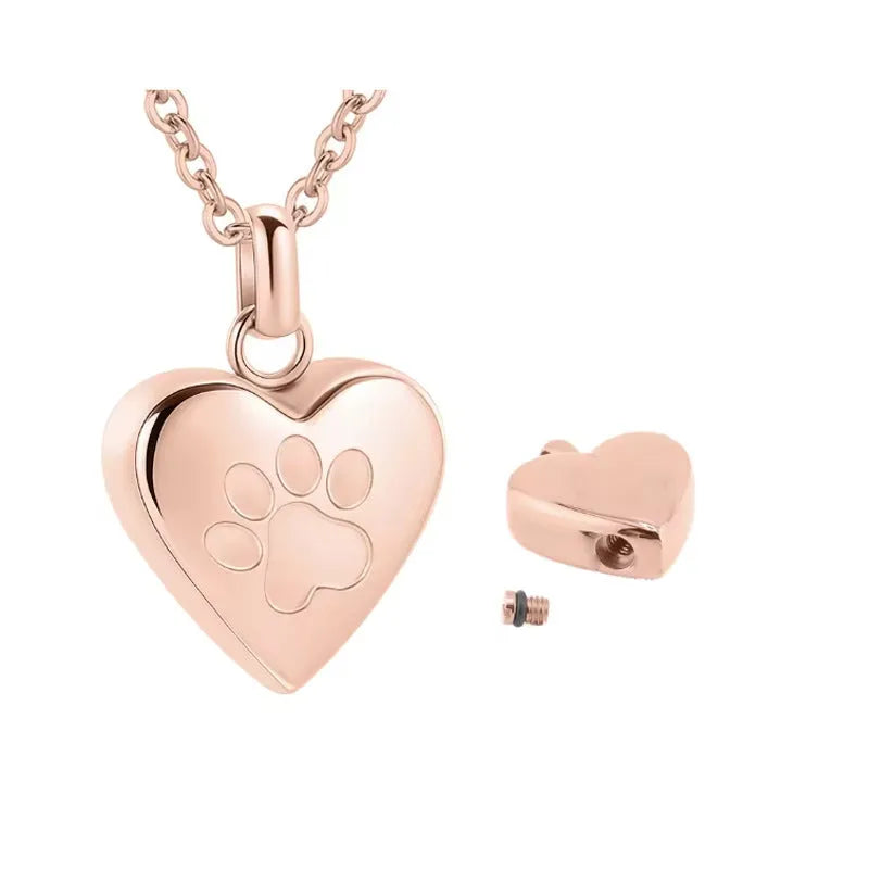 Titanium steel heart pendant necklace with paw print engraving, shown in silver finish.