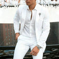 Men's white two-piece wedding suit in slim fit style with jacket and trousers